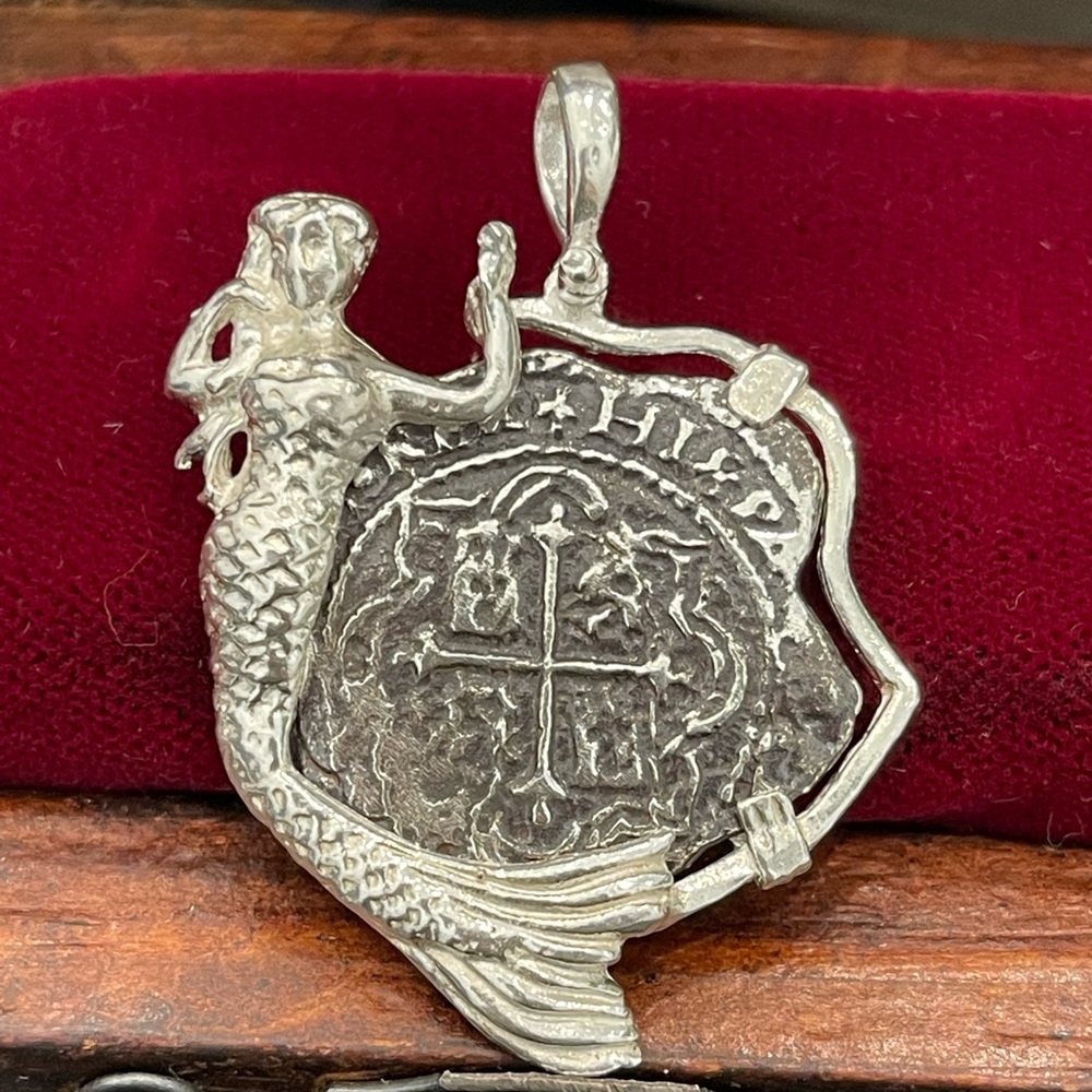 Atocha shipwreck treasure Mel fisher silver coin pendant mermaid bezel